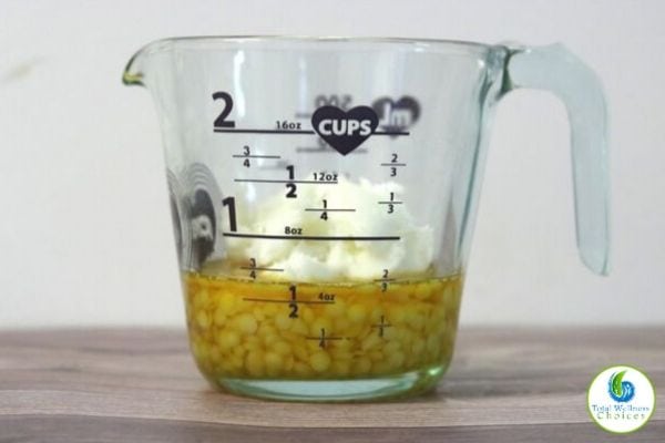 beeswax, shea butter and oil in a measuring cup